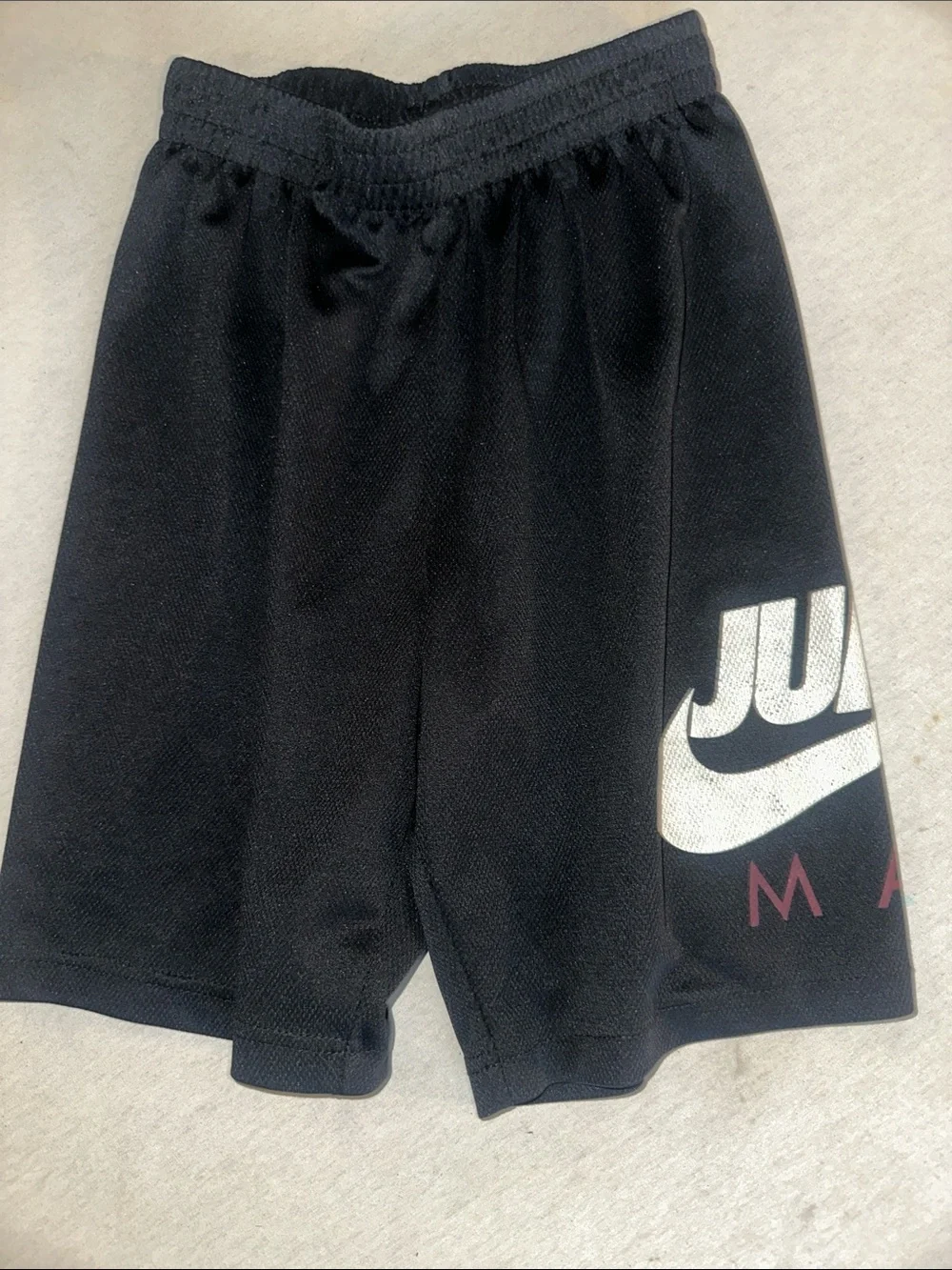 Kids Size M Nike Black Boys' Shorts with White Swoosh and Maroon Accent